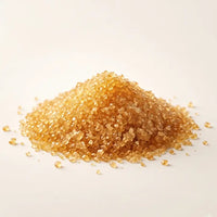 Pile of ox bile crystals on a light beige background. Fluxa Lipid Flow.